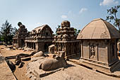 Mamallapuram - Tamil Nadu. The five Rathas. The group of Draupadi Ratha and Nandi the bull, the Arjuna Ratha, Bhima Ratha and Dharmaraja to the south.